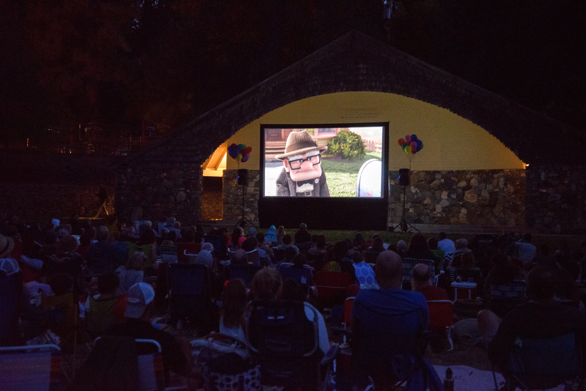 families watching movies under the pines in Nevada City California