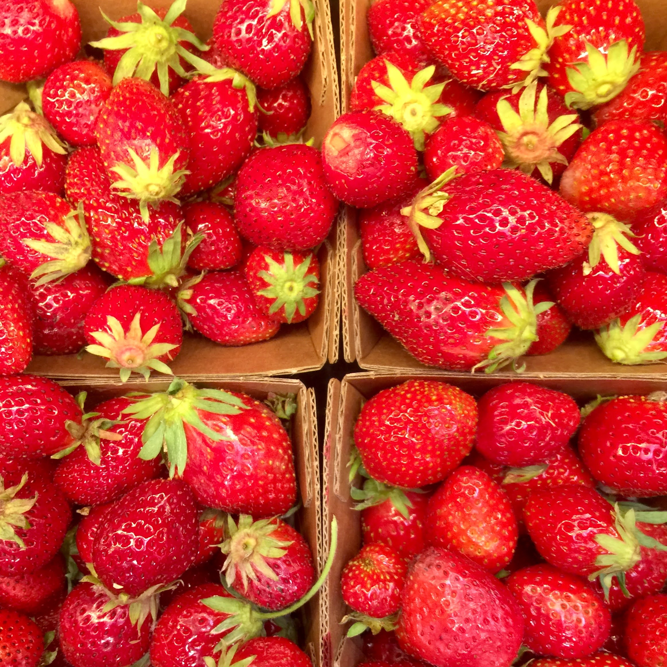 strawberries at a farm stand