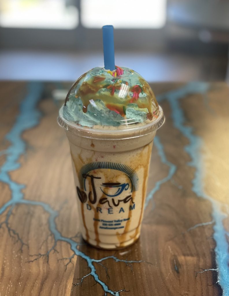 a colorful iced frappuccino made at Java Dream Coffee House in Penn Valley
