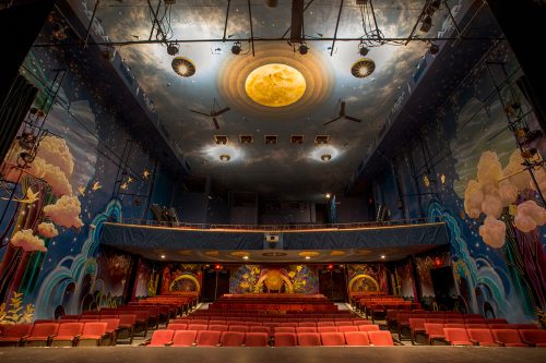a colorful mural depicting the nighty sky inside the Nevada Theatre in Nevada City