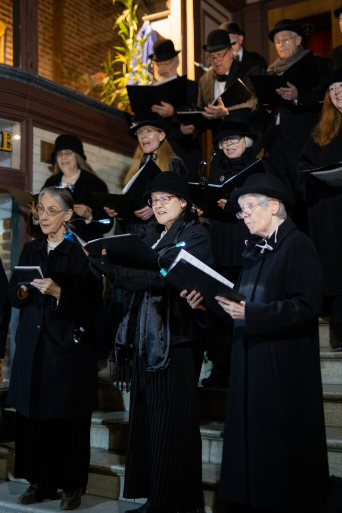 Carolers dressed in 19th century attire at Cornish Christmas Grass Valley