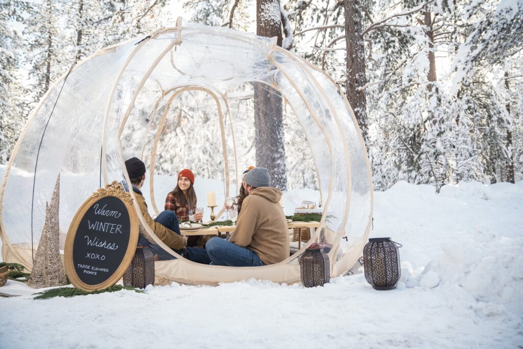 romantic winter picnic surrounded by snow