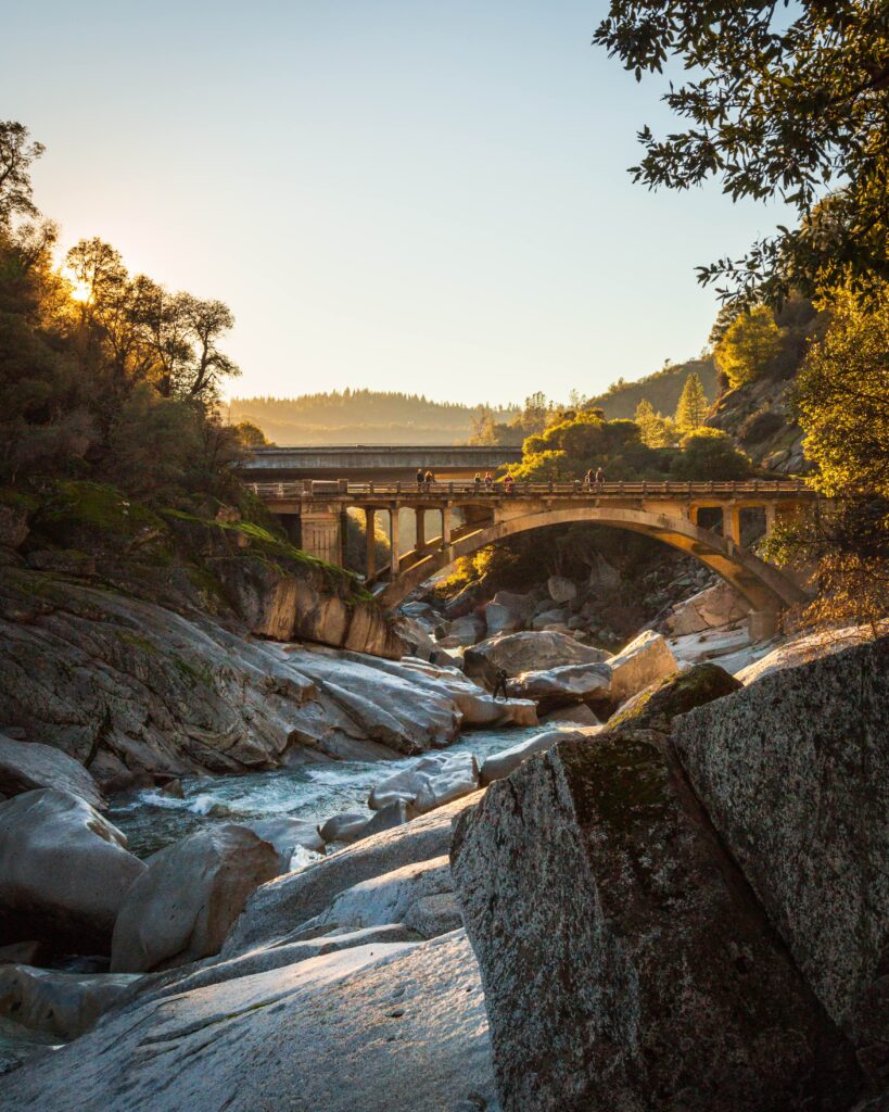 Highway 49 Yuba River crossing at sunset with orginal bridge in the foreground.