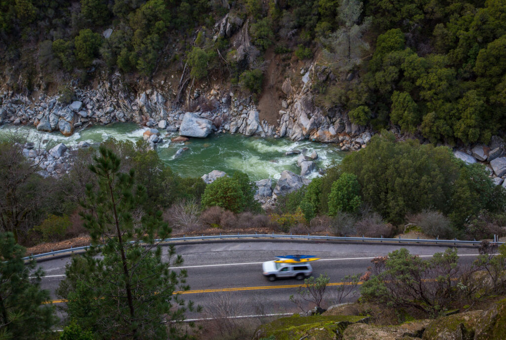 Truck driving on a scenic stretch of the South Yuba River