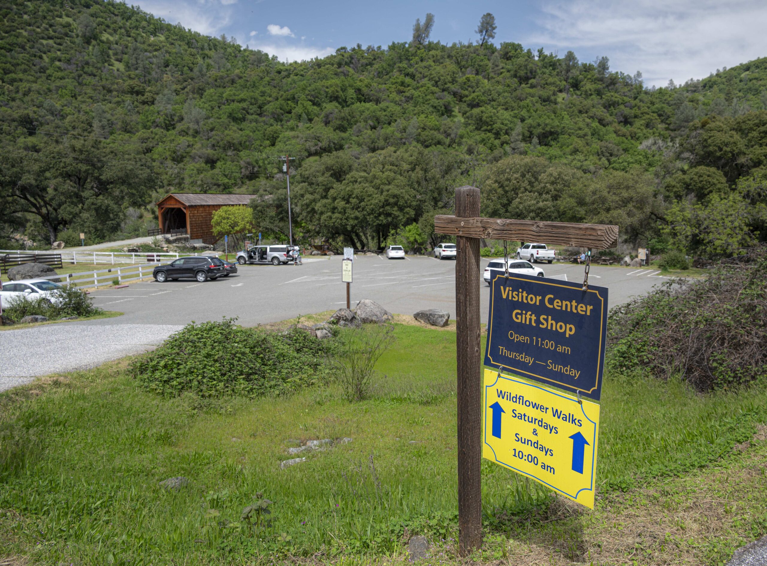 The Visitor Center at South Yuba River State Park with the entrance to the Bridgeport Covered Bridge in the distance