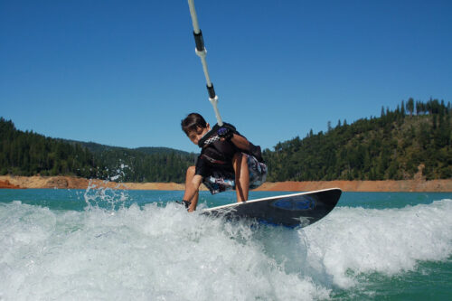 wakeboarding on an alpine lake in Nevada County